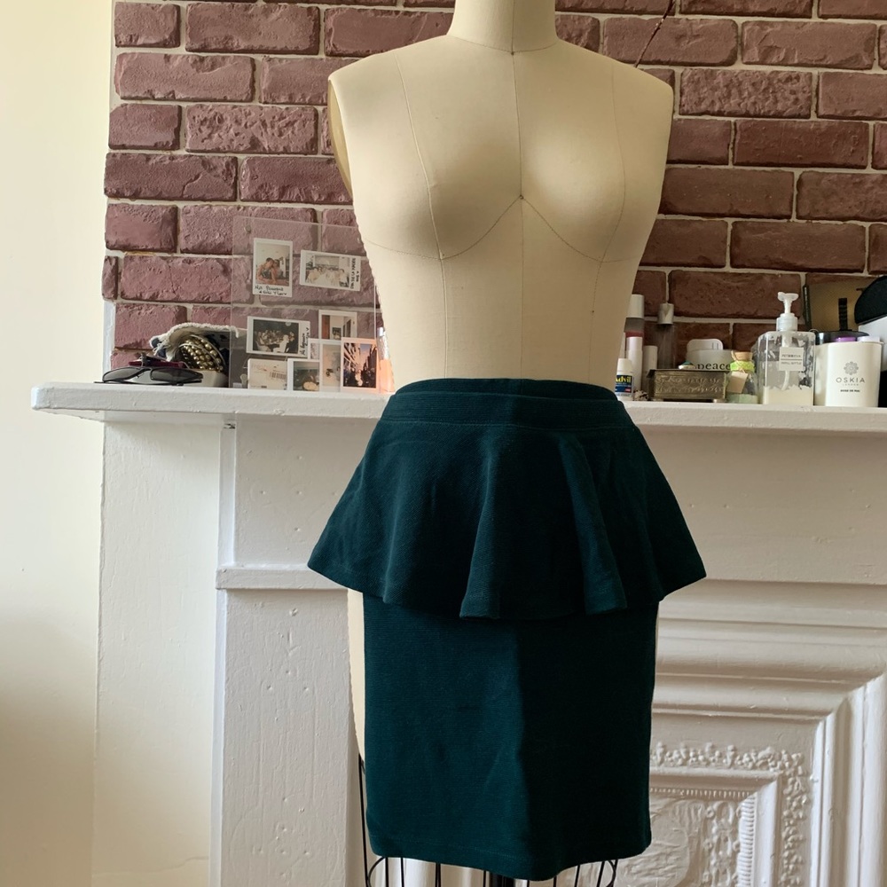 Green peplum mini skirt